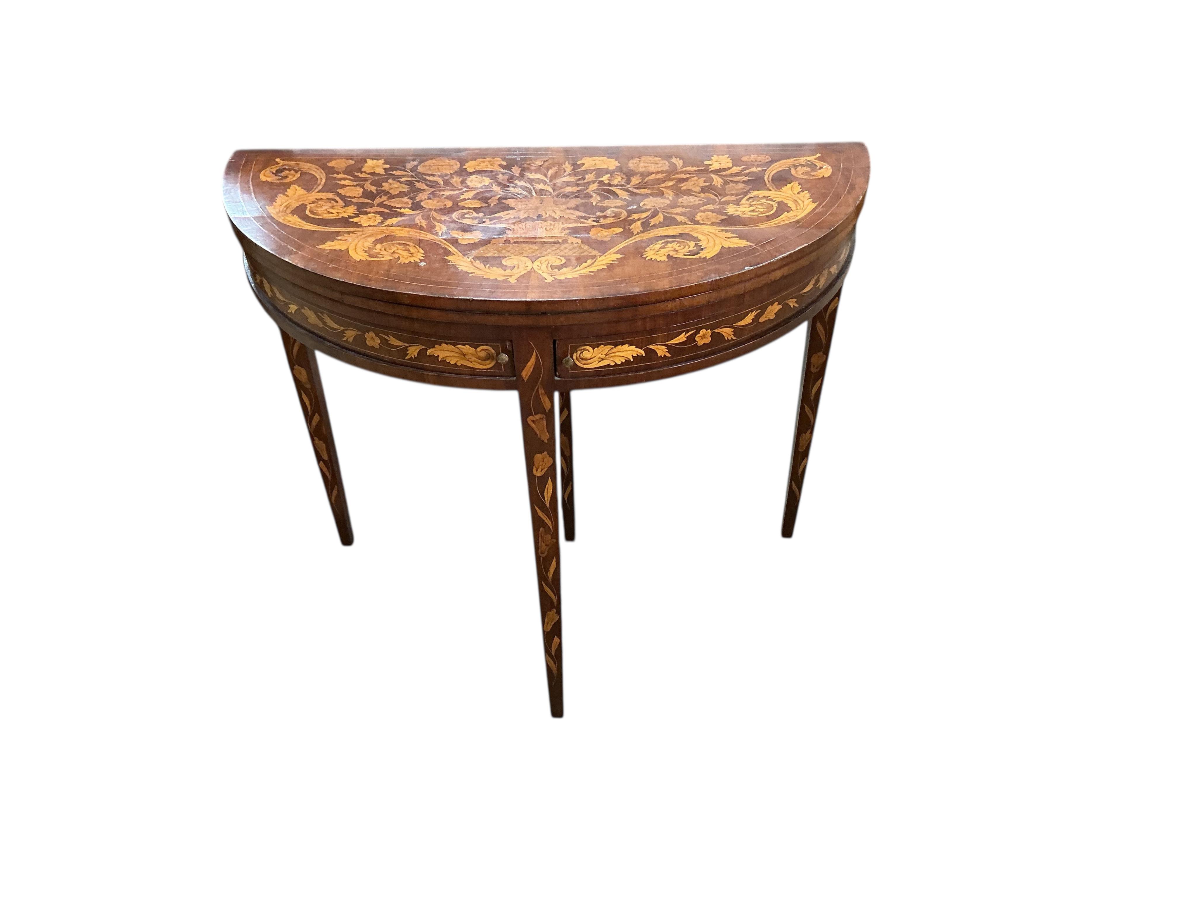 An early 19th century Dutch walnut floral marquetry folding card table, width 88cm, depth 44cm, height 76cm